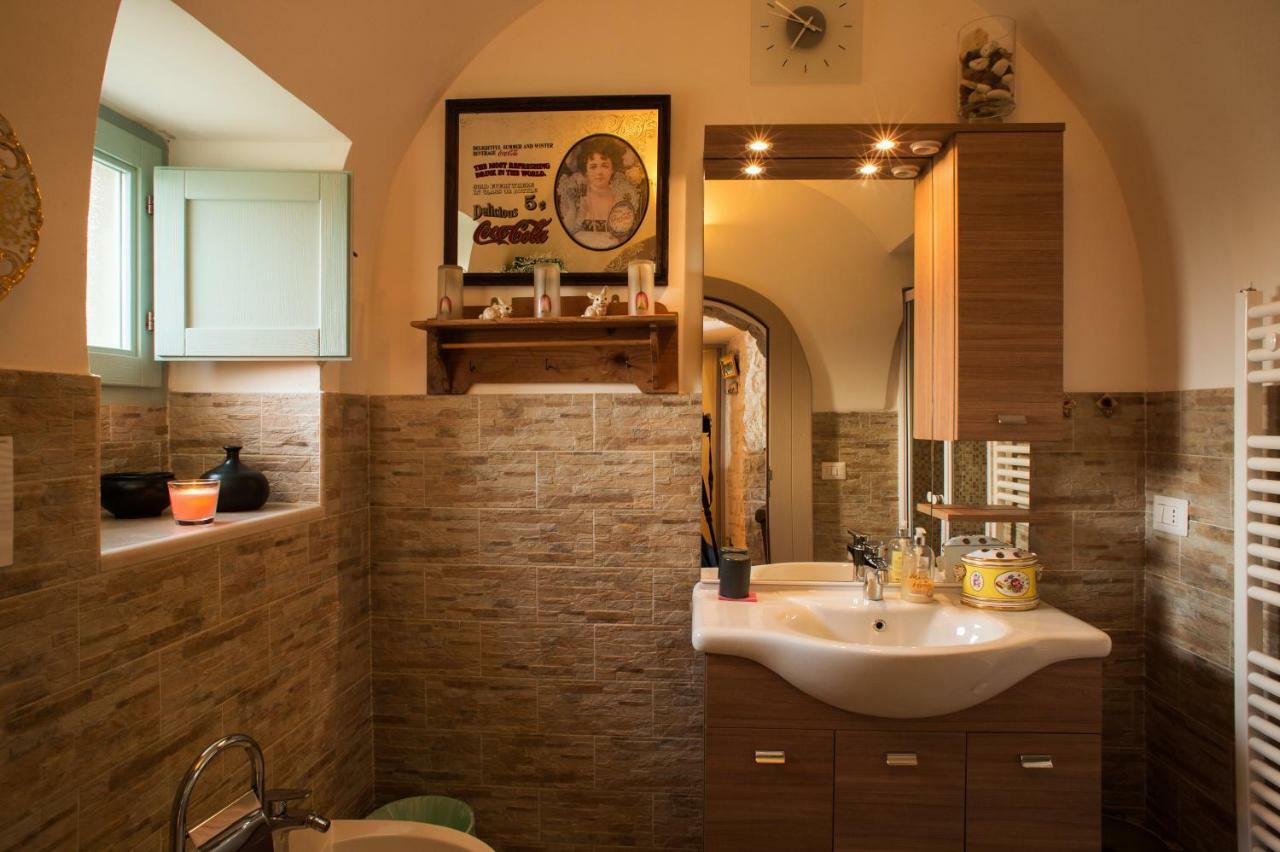 16 Trulli E Giardini Apartment อัลเบโรเบลโล ภายนอก รูปภาพ