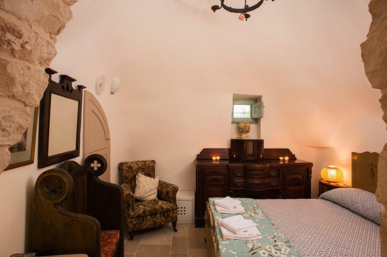 16 Trulli E Giardini Apartment อัลเบโรเบลโล ภายนอก รูปภาพ