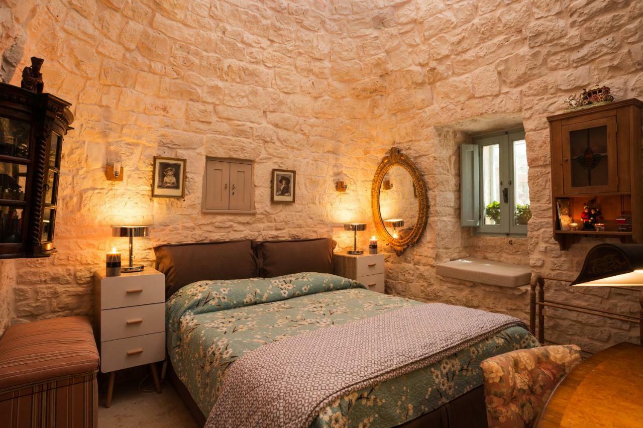 16 Trulli E Giardini Apartment อัลเบโรเบลโล ภายนอก รูปภาพ