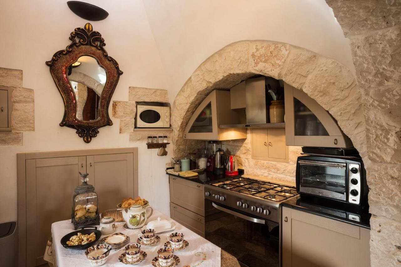 16 Trulli E Giardini Apartment อัลเบโรเบลโล ภายนอก รูปภาพ