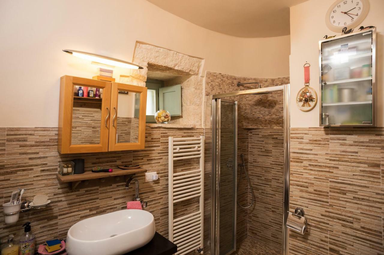 16 Trulli E Giardini Apartment อัลเบโรเบลโล ภายนอก รูปภาพ