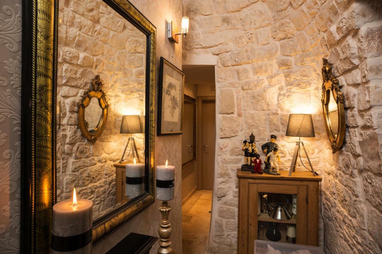 16 Trulli E Giardini Apartment อัลเบโรเบลโล ภายนอก รูปภาพ