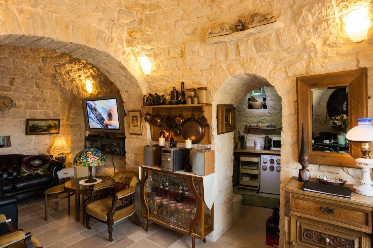 16 Trulli E Giardini Apartment อัลเบโรเบลโล ภายนอก รูปภาพ