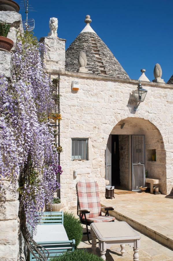 16 Trulli E Giardini Apartment อัลเบโรเบลโล ภายนอก รูปภาพ